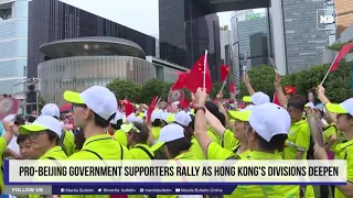 Pro-Beijing government supporters rally as Hong Kong's divisions deepen