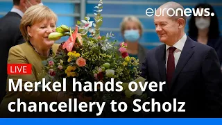 Merkel hands over chancellery to Scholz