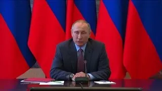 Putin visits Crimea after Ukraine incursion claim