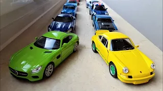 Various cars driving on windowsill