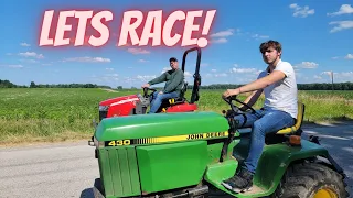 The JOHN DEERE 430 vs MASSEY GC1725MB SUBCOMPACT TRACTOR STREET DRAG RACE you've been WAITING FOR!