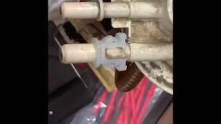 GM how to remove the retaining clip from fuel pump