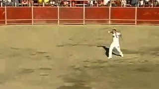 GUY JUMPING OVER A BULL - AMAZING !