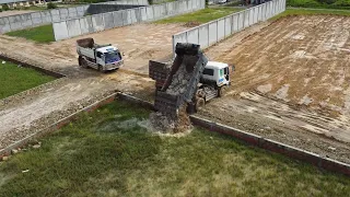 Wonderful By Komatsu D20p Dozer Push the soil into the water With Dump trucks Land transport