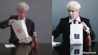 TILL LINDEMANN AND ANDY WARHOL EATING A HAMBURGER