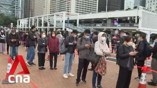 Hours-long queues at COVID testing sites in Hong Kong as infections surge