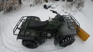 Plowing snow with a Honda fourtrax 300 4x4 atv