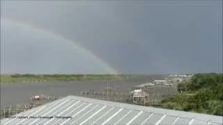 Double Rainbow Forming During Thunderstorm