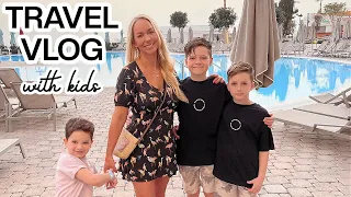 WE'RE IN CYPRUS! ✈️☀️ FAMILY TRAVEL VLOG + FLYING WITH KIDS | Emily Norris