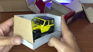 unboxing Die Cast Jeep Wrangler ( yellow ) 1:34 kinsmart