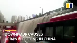 Downpour in China: rains flood subway and halt commuters