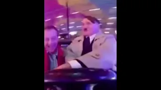 Adolf hitler driving a bumper car