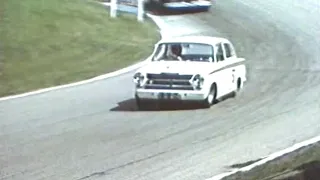 Jim clark driving his ford cortina rally car and touring car