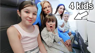 Flying Abroad with 4 KIDS on MYSTERY Vacation! | Family Fizz