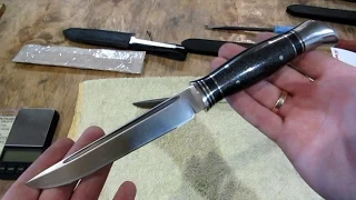 NKVD knife. Handle from titanium and carbon fiber. Overview of the knife