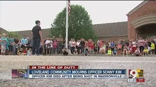 Sonny Kim: Community mourns fallen police officer at evening vigil