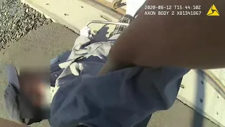 RAW: Police officer rescues man in wheelchair trapped on railroad tracks