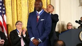 Michael Jordan receives the Presidential Medal of Freedom from Barack Obama