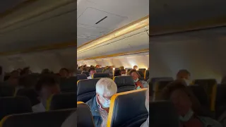 Unruly passenger on Ryanair flight from Ibiza to Bergamo spits on passenger, pull hair of another.