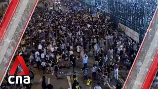 Hong Kong protesters block roads in Tsuen Wan, Causeway Bay