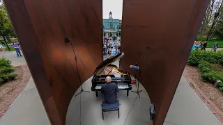 Pianist Paul Barnes performs Philip Glass inside Richard Serra Sculpture