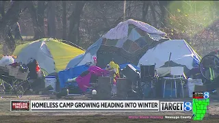 As Kalamazoo homeless camp grows, so do its needs