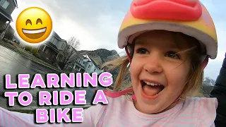 LEARNING TO RIDE A BIKE | 4 YEAR OLD LEARNS TO RIDE A BIKE FOR THE FIRST TIME | PRICELESS REACTION
