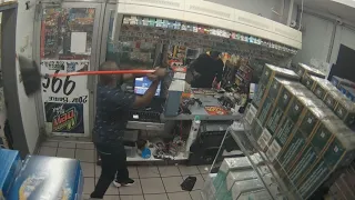 Broom vs. knife: Clerk swats armed robber