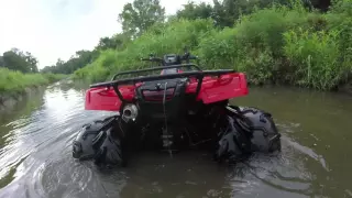 Ridiculous 8 wheel dually Honda Rubicon ATV floating and mudding 100% amphibious