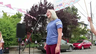 Leilani Nitkey sings the national anthem for 2019 West Seattle 4th of July Kids' Parade