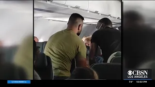 American Airlines staff duct tape 13-year-old boy after trying to kick out window