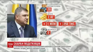 У 25 затриманих екс-посадовців вилучили кілограми золота, срібла та мільйони у валюті