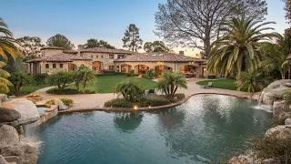 $11,498,000! Magnificent resort style estate in La Jolla with rock waterslide pool and spa