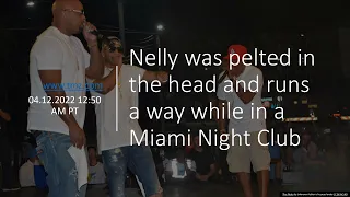 Nelly was pelted in the head and runs a way while in a Miami Night Club