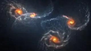 Four galaxies interacting and merging together (N-body simulation)