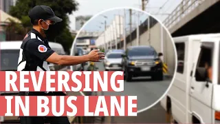 Cars reversing during bus lane enforcement operation