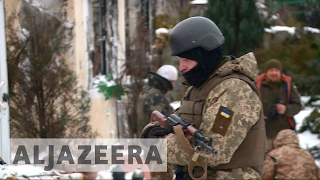 Surge in fighting in eastern Ukraine battlefields