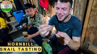 Sucking in SNAILS at Hornbill festival with Nagaland tribe