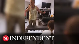 Robbie Williams serenaded by 10-year-old daughter in home video