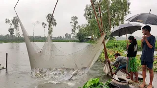 Unbelievable fishing in rainy day | Traditional Village Fishing culture in Flood Water