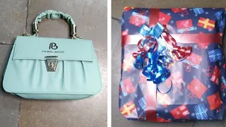 How to wrap a bag/purse | gift wrapping ideas|diy easy gift packing ideas #wrapping #wrappinggifts