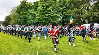Glendaruel Highlanders by the massed Pipes and Drums on the march during 2024 Gordon Castle Games