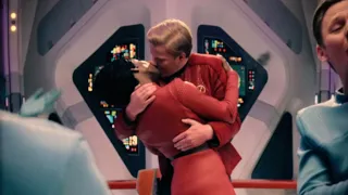 captain daly kisses his female crewmates