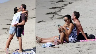 Jordana Brewster and husband Mason Morfit share a passionate kiss at the beach