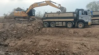 Dump truck and Excavator kobelco and Excavator cat