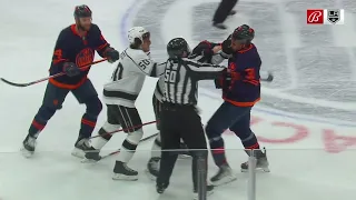 Zack Kassian cross-checks Sean Durzi after the whistle.