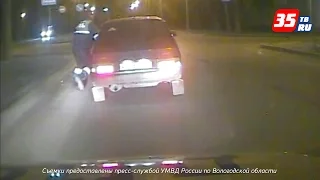Пьяный водитель, пытаясь скрыться, полкилометра тащил полицейского за машиной