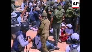 IDF troops and protesters clash at anti-barrier demo