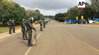 Brazil forces monitor Bolsonaro supporters' camp