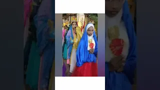 kids dressed as Mother Mary on her feast